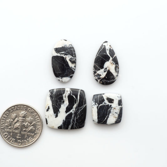 Natural White Buffalo Stone Cabochons are semi-precious gemstones cut into shapes ideal for jewelry-making, making them an excellent choice for artisans.