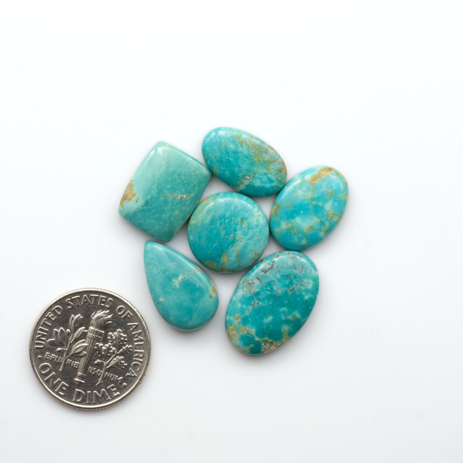 Experience the beauty of Turquoise Mountain Cabochons. With their distinctive blue and green color, these gemstones are perfect for any jewelry piece.