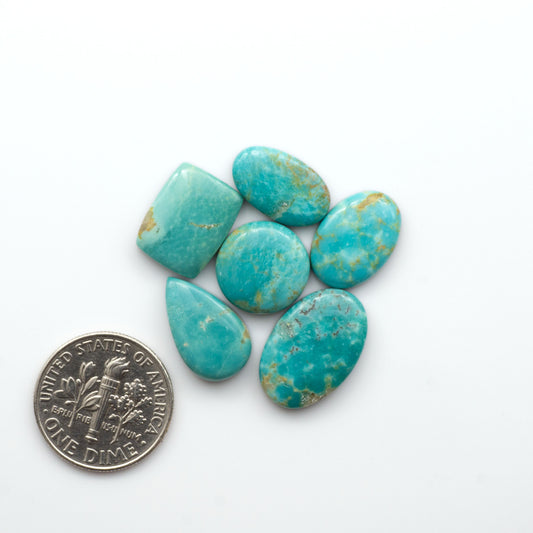 Experience the beauty of Turquoise Mountain Cabochons. With their distinctive blue and green color, these gemstones are perfect for any jewelry piece.