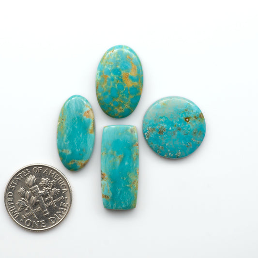 Experience the beauty of Turquoise Mountain Cabochons. With their distinctive blue and green color, these gemstones are perfect for any jewelry piece.