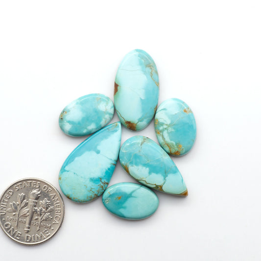 Add a touch of beauty to your collection with our stunning Pilot Mountain Turquoise Cabochons. Perfect for jewelry making each piece is truly one-of-a-kind.