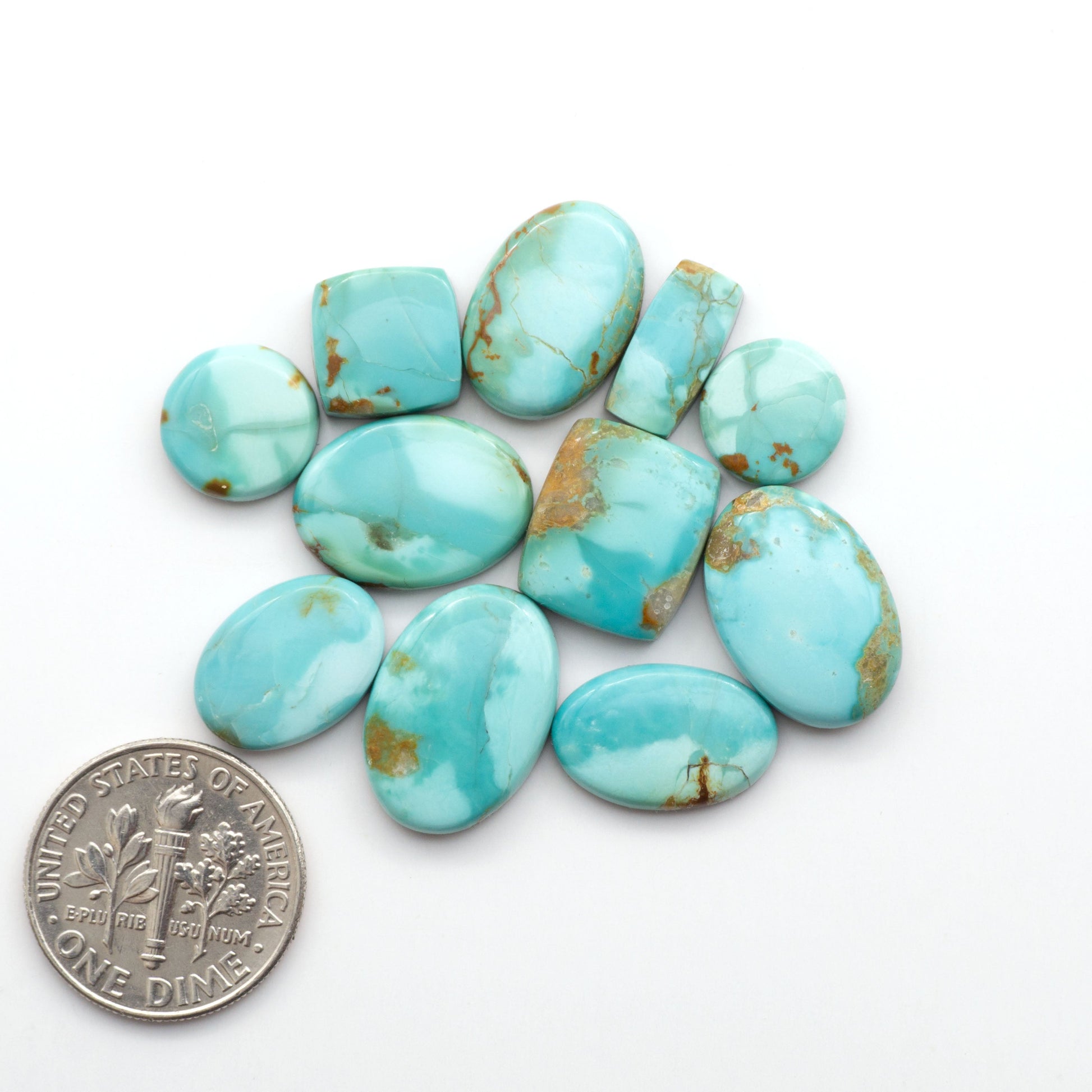 Add a touch of beauty to your collection with our stunning Pilot Mountain Turquoise Cabochons. Perfect for jewelry making each piece is truly one-of-a-kind.