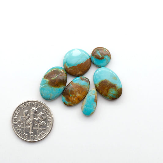 Add a touch of beauty to your collection with our stunning Pilot Mountain Turquoise Cabochons. Perfect for jewelry making each piece is truly one-of-a-kind.
