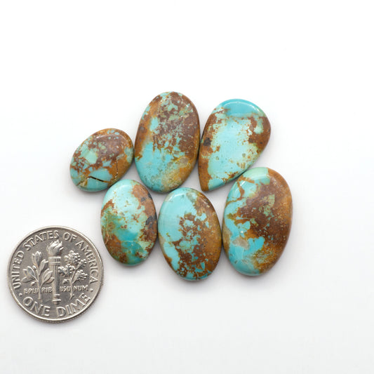 Add a touch of beauty to your collection with our stunning Pilot Mountain Turquoise Cabochons. Perfect for jewelry making each piece is truly one-of-a-kind.