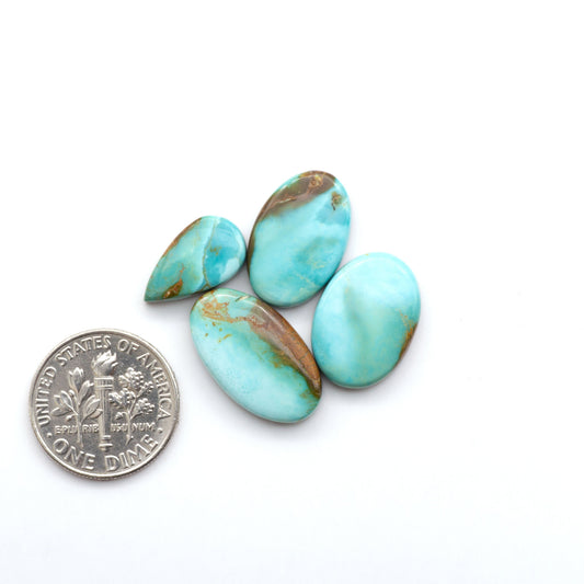 Add a touch of beauty to your collection with our stunning Pilot Mountain Turquoise Cabochons. Perfect for jewelry making each piece is truly one-of-a-kind.