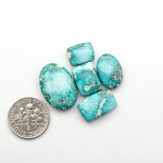 White Water Turquoise Cabochons with their mesmerizing patterns and one-of-a-kind colors, are perfect for those looking for a unique and eye-catching piece.