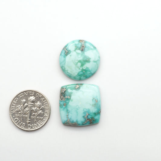 White Water Turquoise Cabochons with their mesmerizing patterns and one-of-a-kind colors, are perfect for those looking for a unique and eye-catching piece.