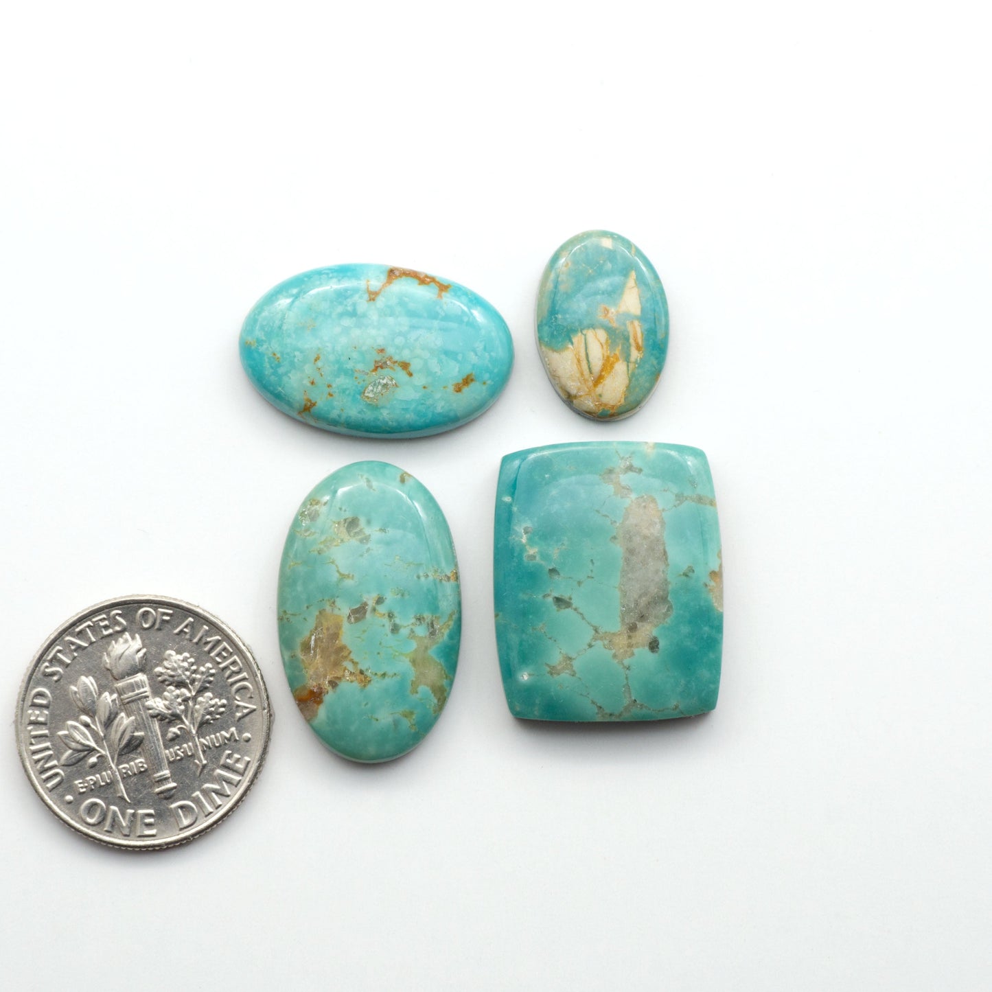 Experience the beauty of Turquoise Mountain Cabochons. With their distinctive blue and green color, these gemstones are perfect for any jewelry piece.