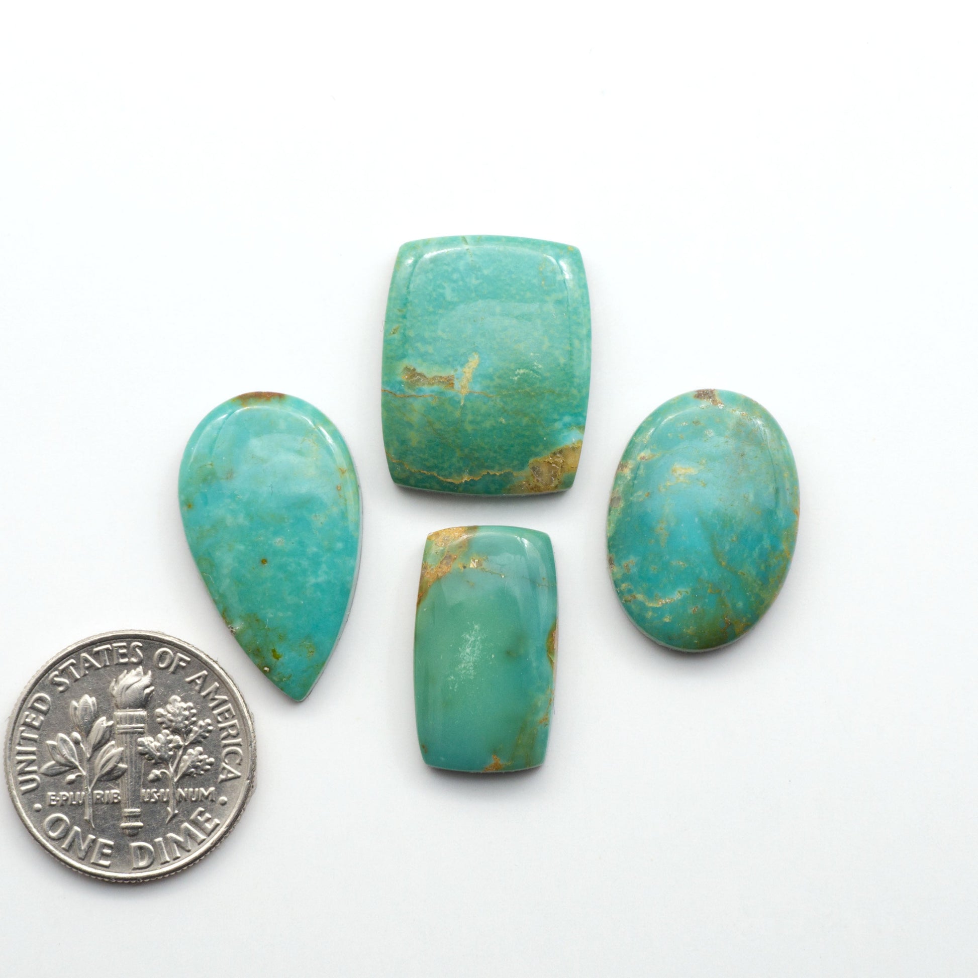 Experience the beauty of Turquoise Mountain Cabochons. With their distinctive blue and green color, these gemstones are perfect for any jewelry piece.