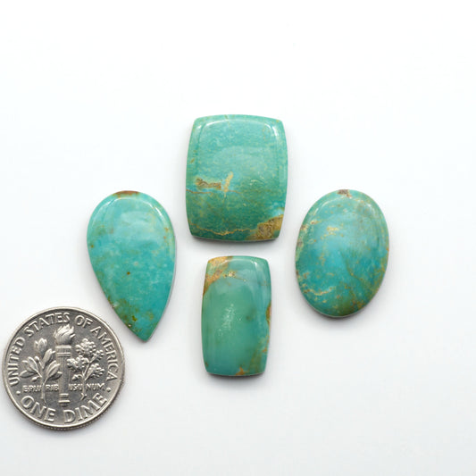 Experience the beauty of Turquoise Mountain Cabochons. With their distinctive blue and green color, these gemstones are perfect for any jewelry piece.