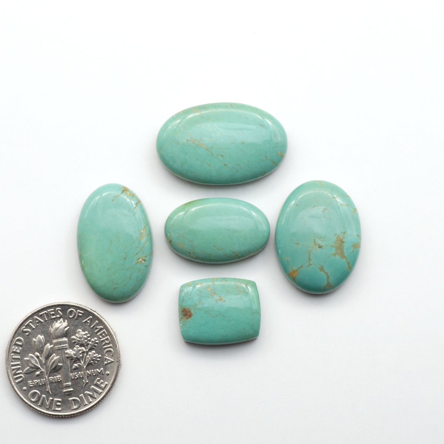Experience the beauty of Turquoise Mountain Cabochons. With their distinctive blue and green color, these gemstones are perfect for any jewelry piece.