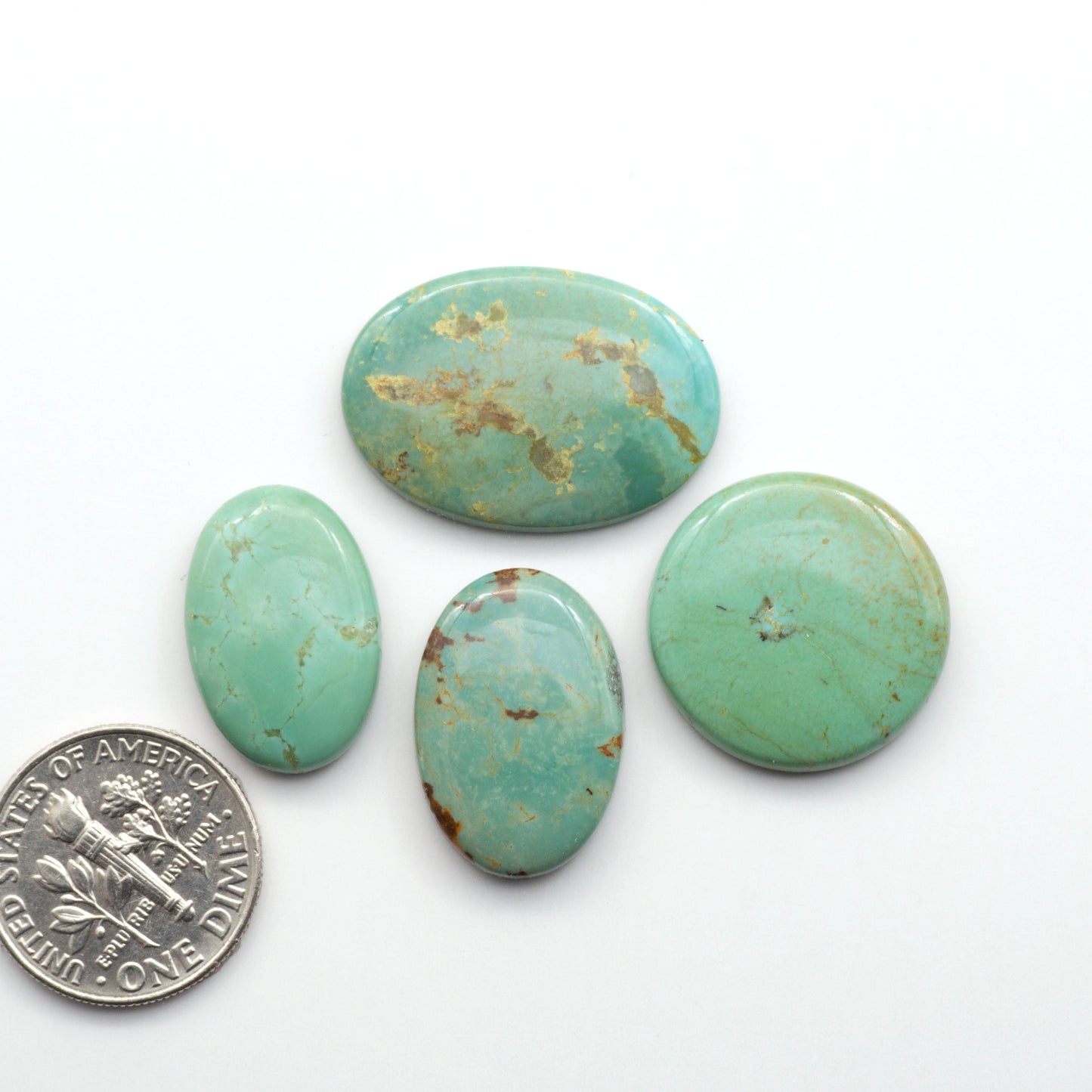 Experience the beauty of Turquoise Mountain Cabochons. With their distinctive blue and green color, these gemstones are perfect for any jewelry piece.