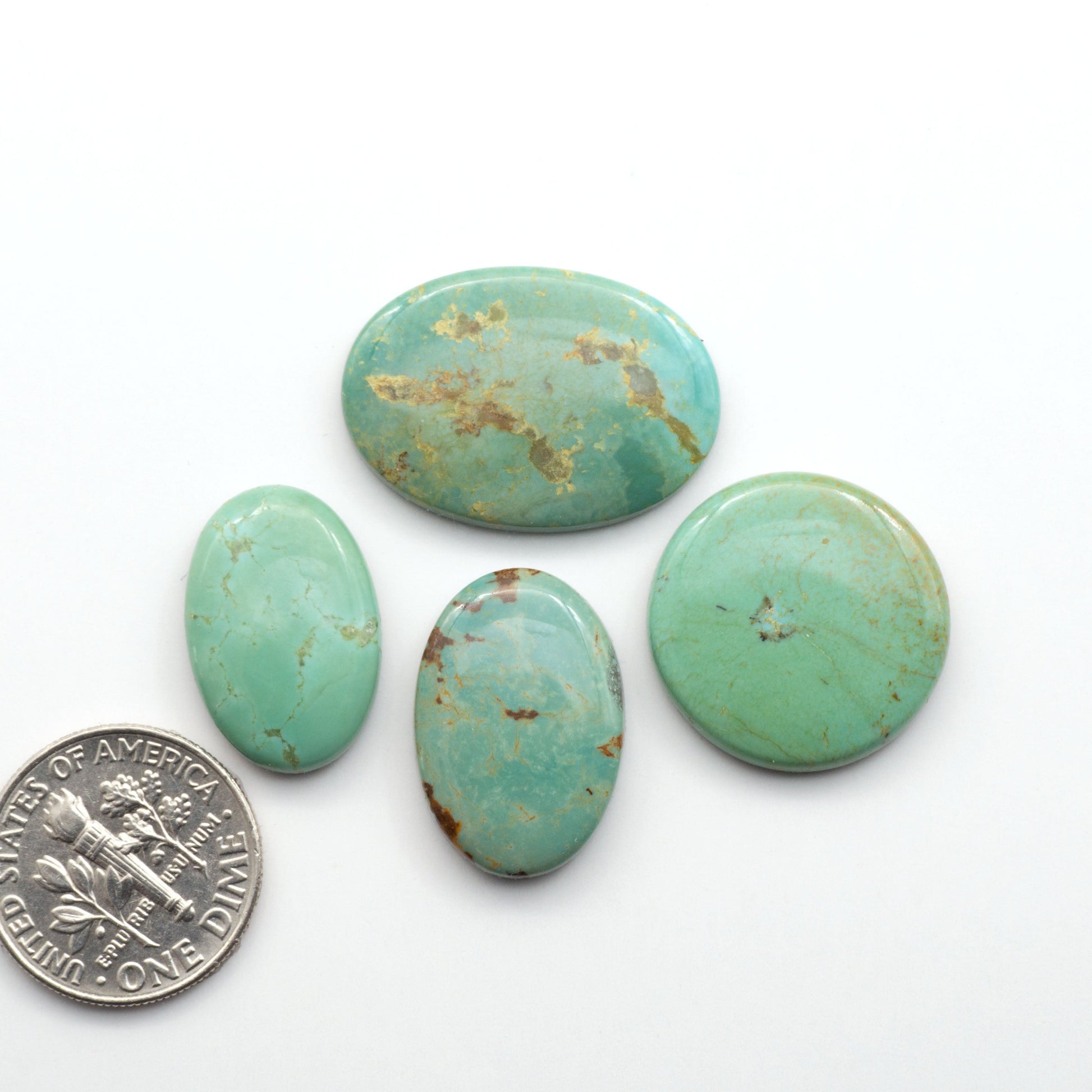 Experience the beauty of Turquoise Mountain Cabochons. With their distinctive blue and green color, these gemstones are perfect for any jewelry piece.