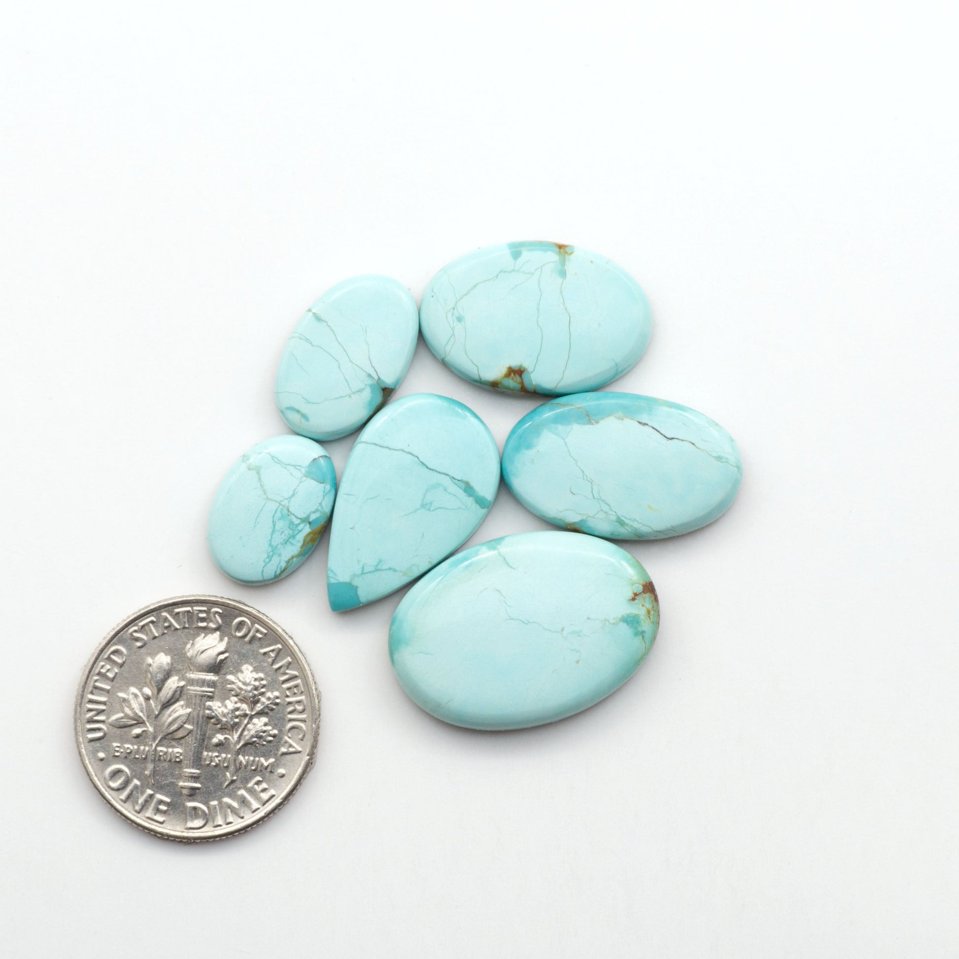 Add a touch of beauty to your collection with our stunning Pilot Mountain Turquoise Cabochons. Perfect for jewelry making each piece is truly one-of-a-kind.