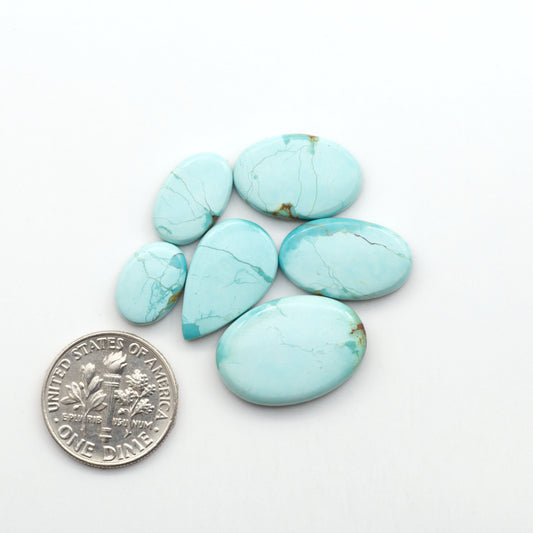 Add a touch of beauty to your collection with our stunning Pilot Mountain Turquoise Cabochons. Perfect for jewelry making each piece is truly one-of-a-kind.