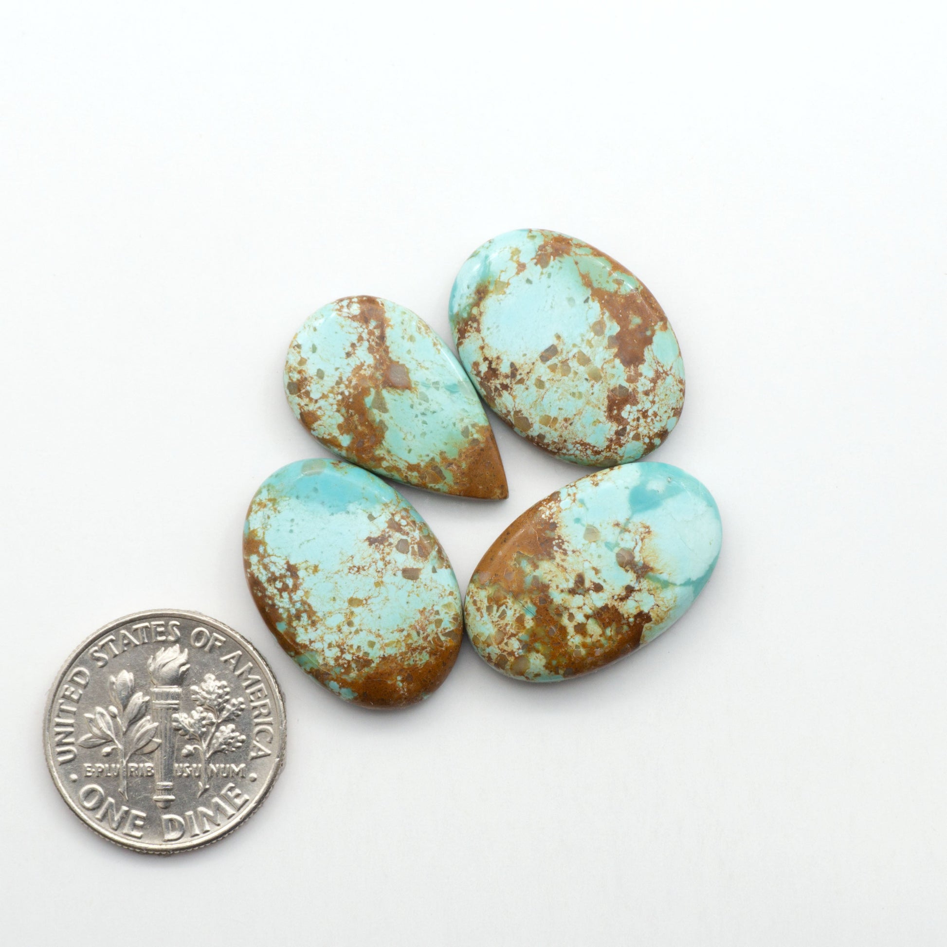 Add a touch of beauty to your collection with our stunning Pilot Mountain Turquoise Cabochons. Perfect for jewelry making each piece is truly one-of-a-kind.