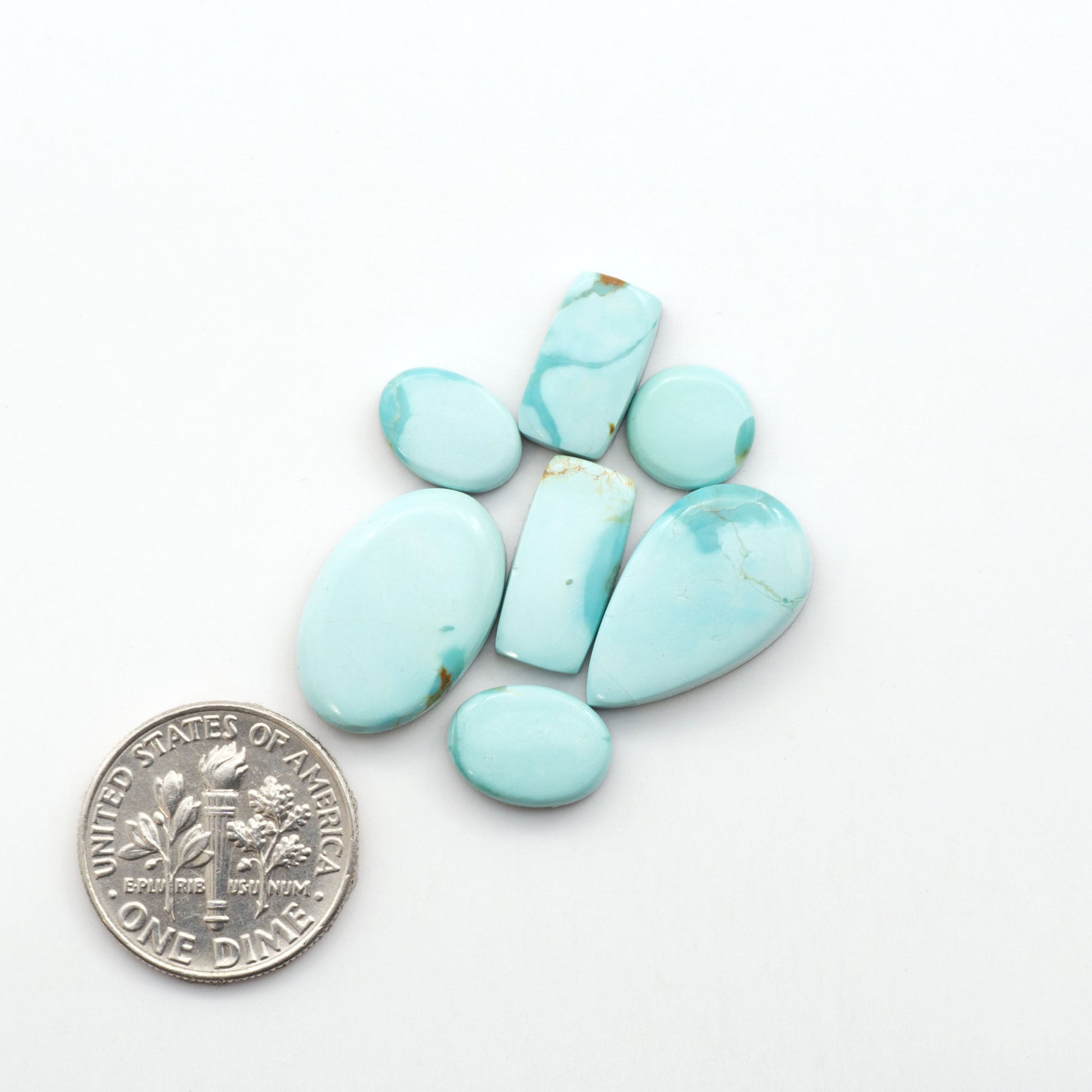 Add a touch of beauty to your collection with our stunning Pilot Mountain Turquoise Cabochons. Perfect for jewelry making each piece is truly one-of-a-kind.