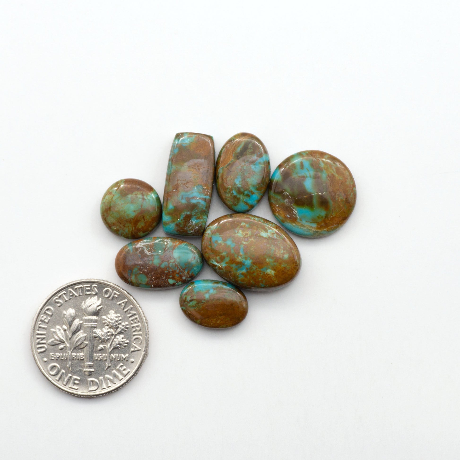Add a touch of beauty to your collection with our stunning Pilot Mountain Turquoise Cabochons. Perfect for jewelry making each piece is truly one-of-a-kind.