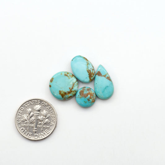 Add a touch of beauty to your collection with our stunning Pilot Mountain Turquoise Cabochons. Perfect for jewelry making each piece is truly one-of-a-kind.
