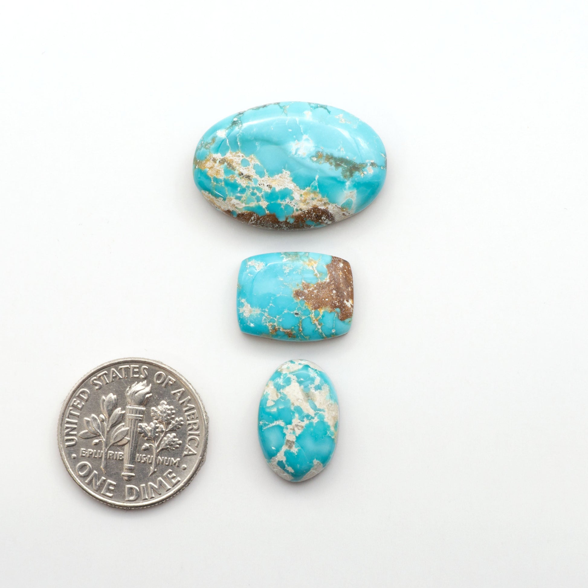 Experience the unique beauty of Fox Turquoise, mined in Nevada, USA. These natural cabochons are backed for added strength. 