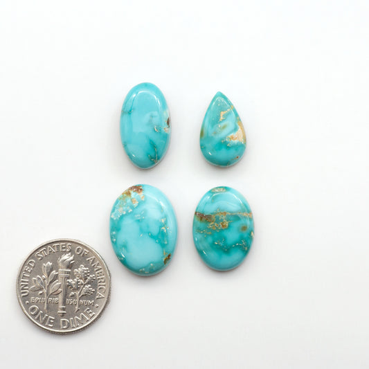 Experience the unique beauty of Fox Turquoise, mined in Nevada, USA. These natural cabochons are backed for added strength. 