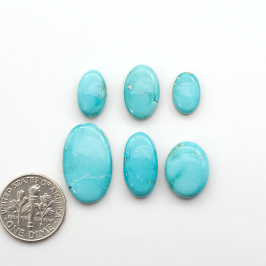 Experience the unique beauty of Fox Turquoise, mined in Nevada, USA. These natural cabochons are backed for added strength. 