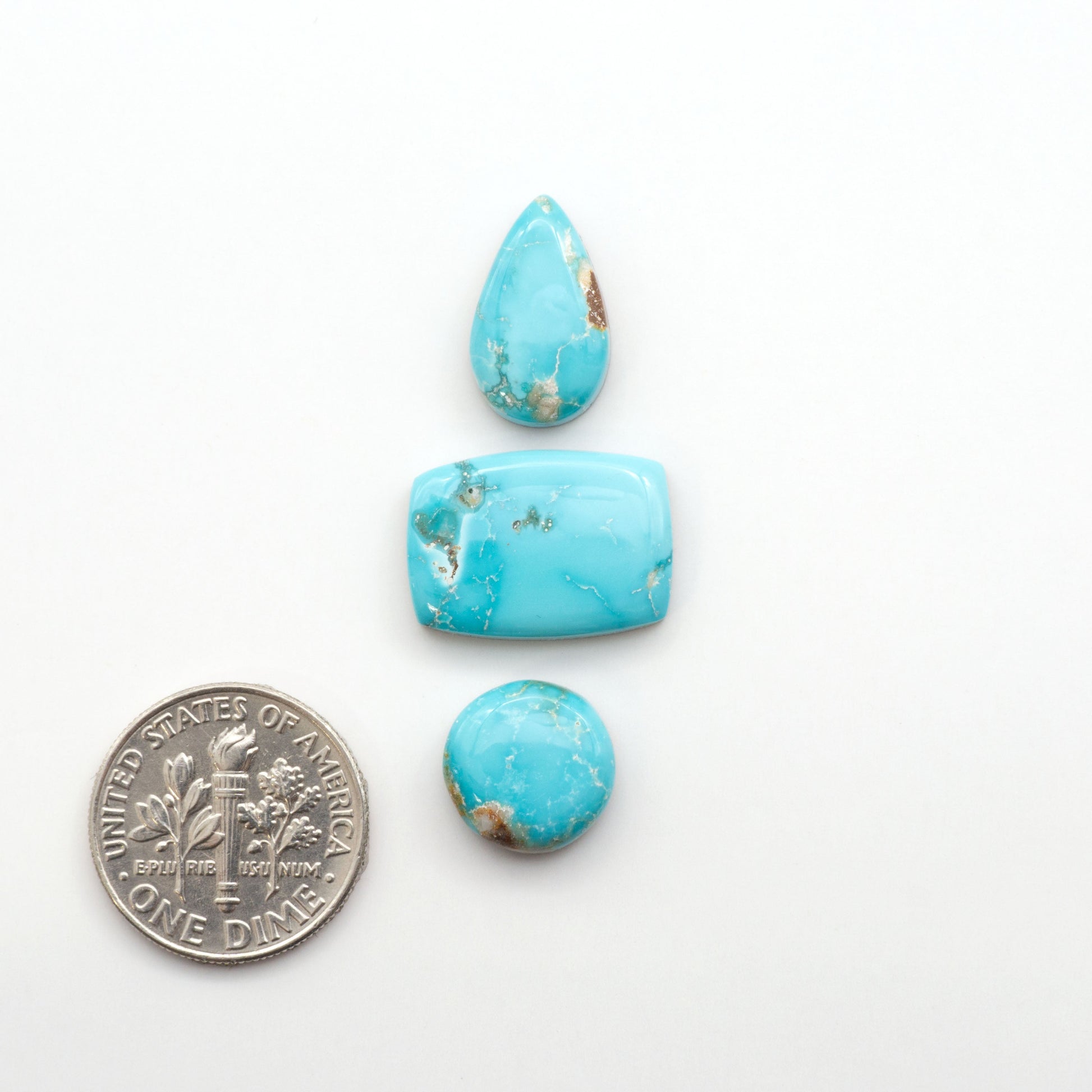 Experience the unique beauty of Fox Turquoise, mined in Nevada, USA. These natural cabochons are backed for added strength. 