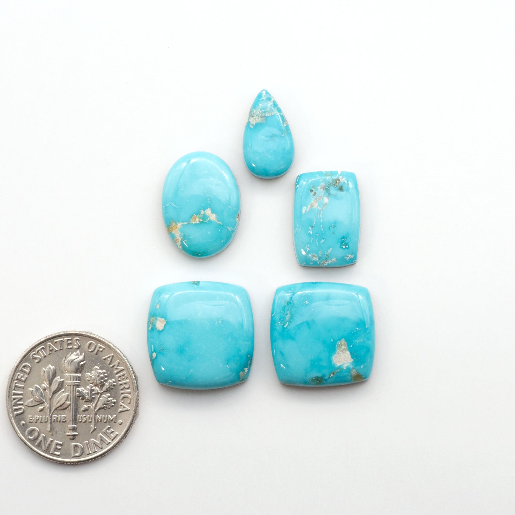 Experience the unique beauty of Fox Turquoise, mined in Nevada, USA. These natural cabochons are backed for added strength. 