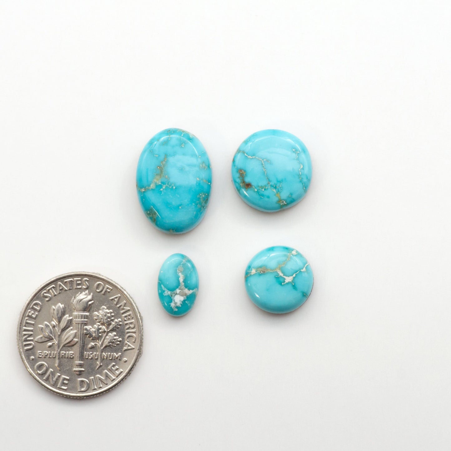 Experience the unique beauty of Fox Turquoise, mined in Nevada, USA. These natural cabochons are backed for added strength. 