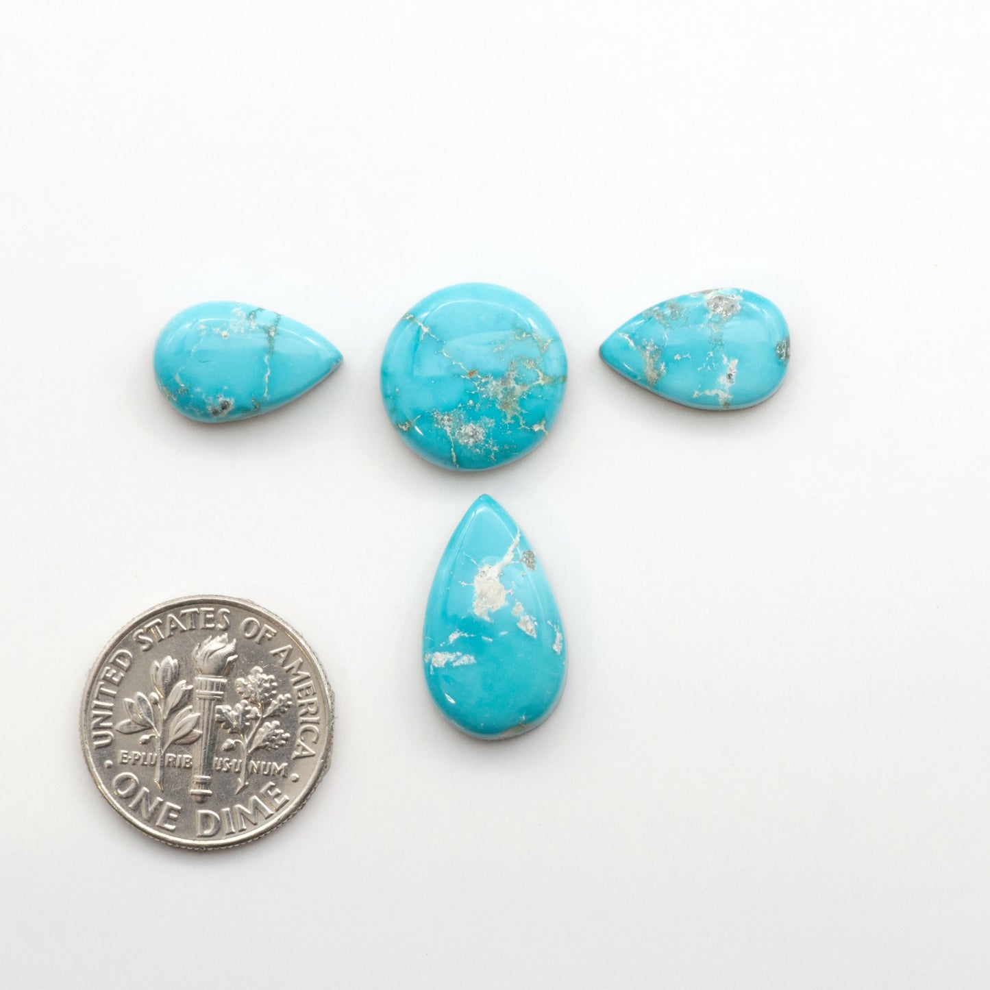 Experience the unique beauty of Fox Turquoise, mined in Nevada, USA. These natural cabochons are backed for added strength. 