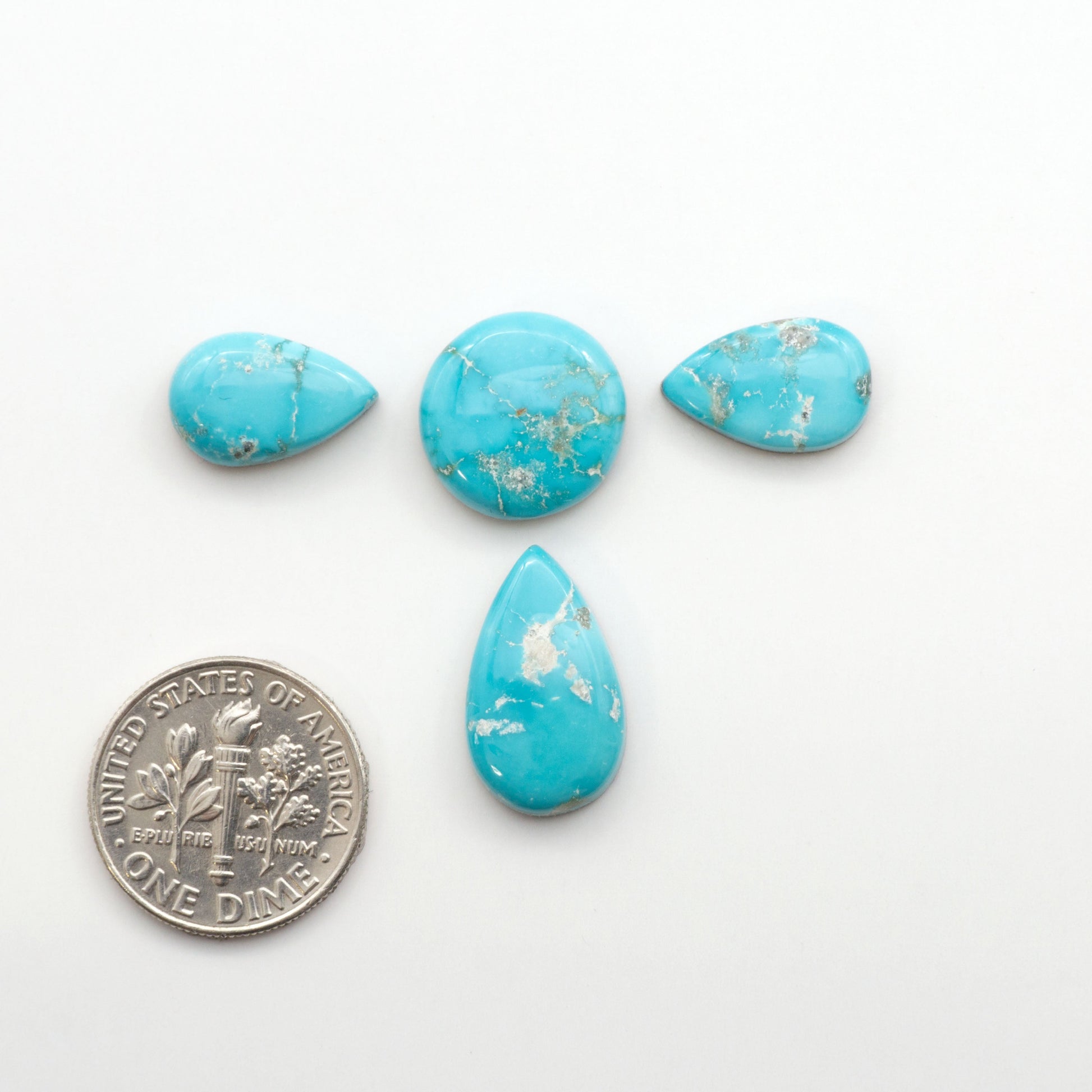 Experience the unique beauty of Fox Turquoise, mined in Nevada, USA. These natural cabochons are backed for added strength. 