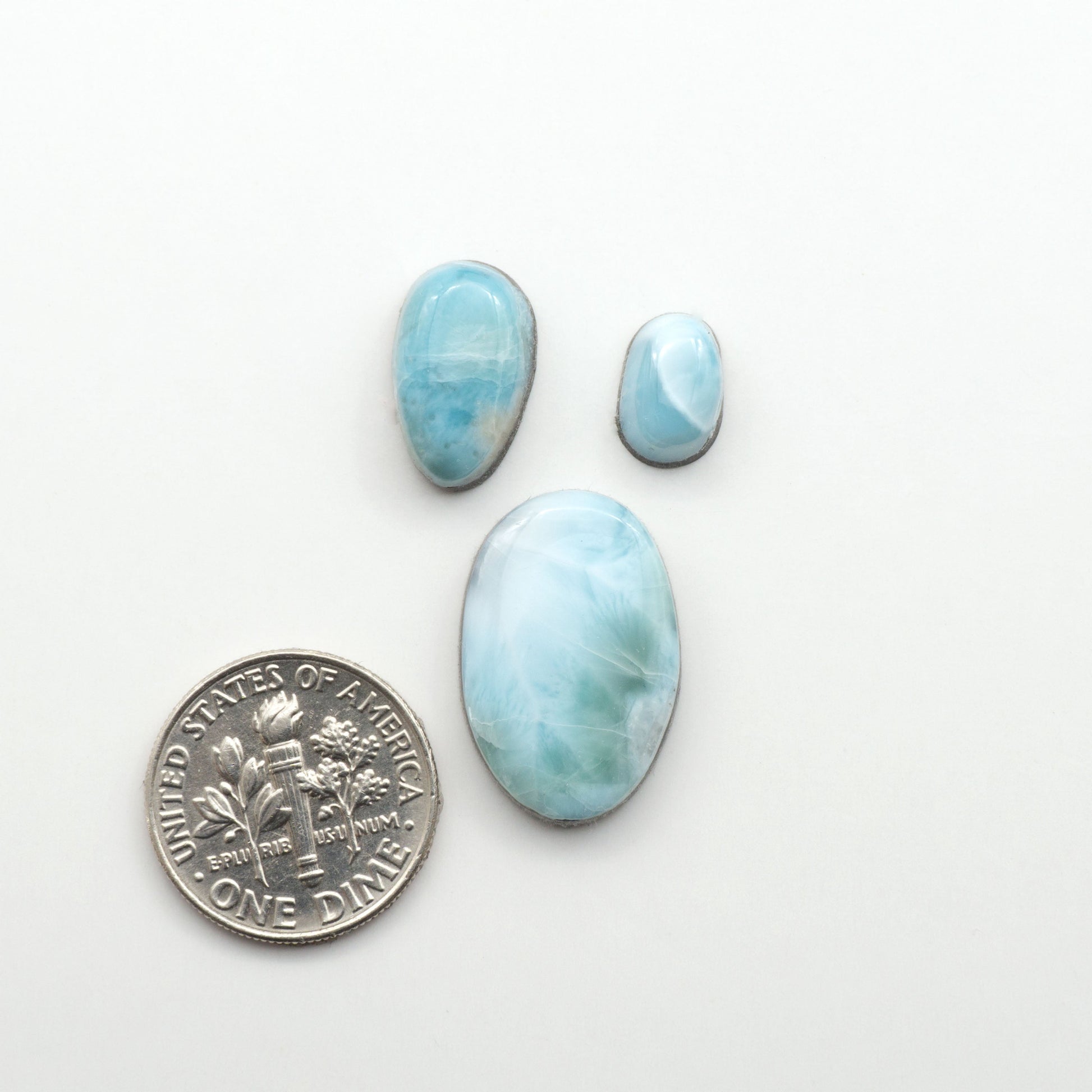 Discover the beauty of Larimar Cabochons. Cut to emphasize the stone's natural patterns and colors. Add a touch of natural beauty to your jewelry designs.