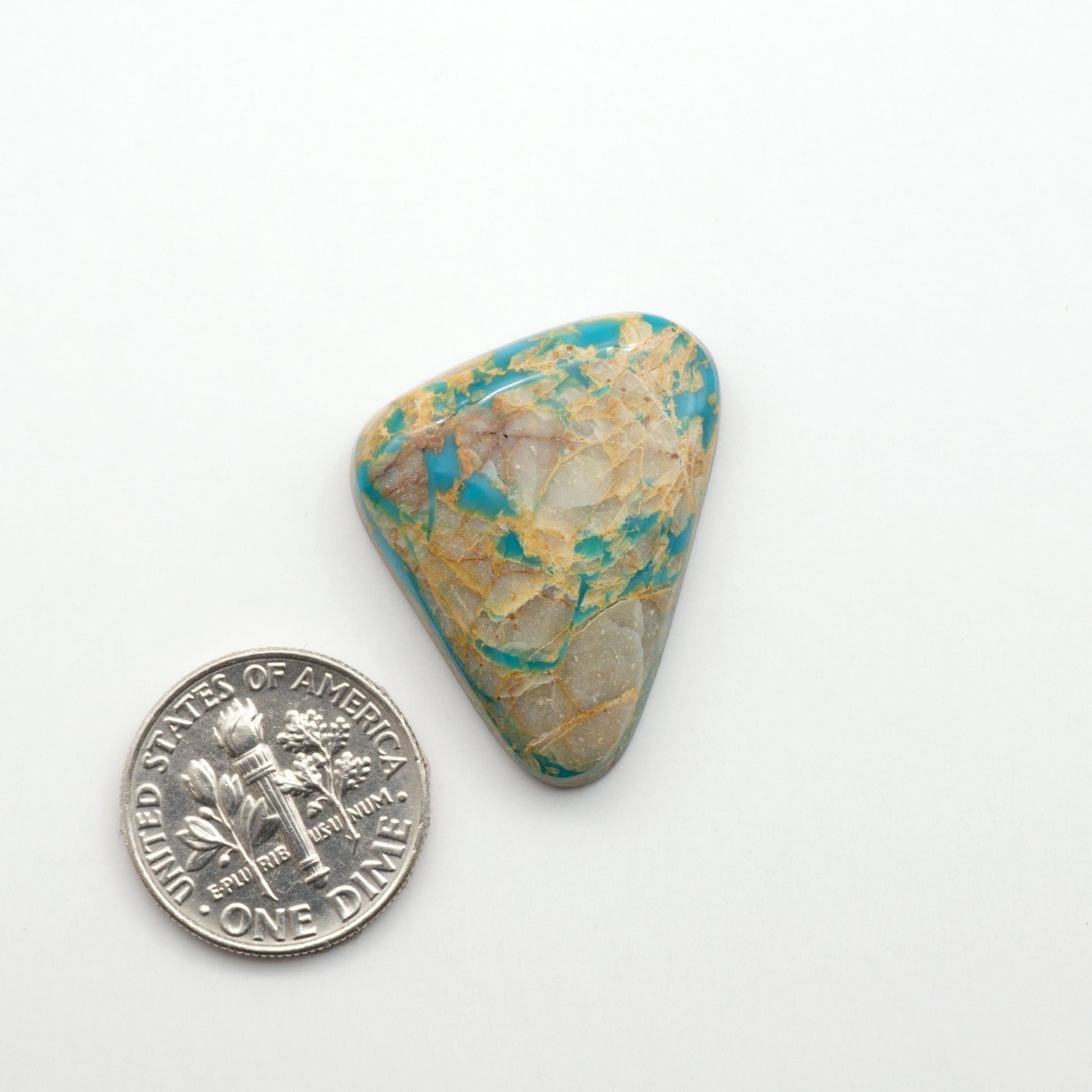 Royston Turquoise cabochons are famous for their distinctive matrix and unique green and blue hues, making them a favored option among jewelry designers.