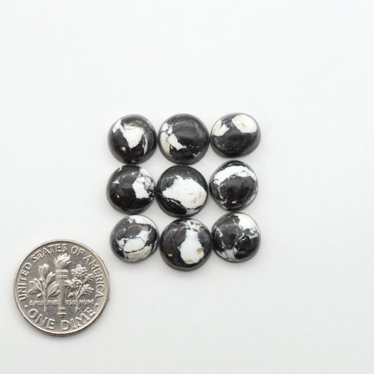 These White Buffalo Cabochons are expertly cut and polished from composite material, resulting in a stunning and long-lasting gemstone.