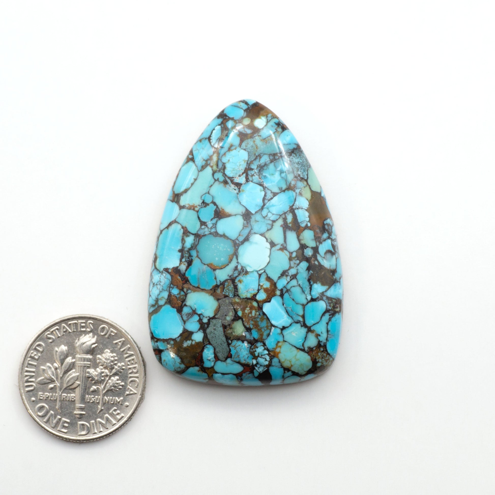 Enhance your jewelry designs with Pressed Turquoise Nugget Cabochons. Crafted from composite materials they add a captivating touch to your creations.