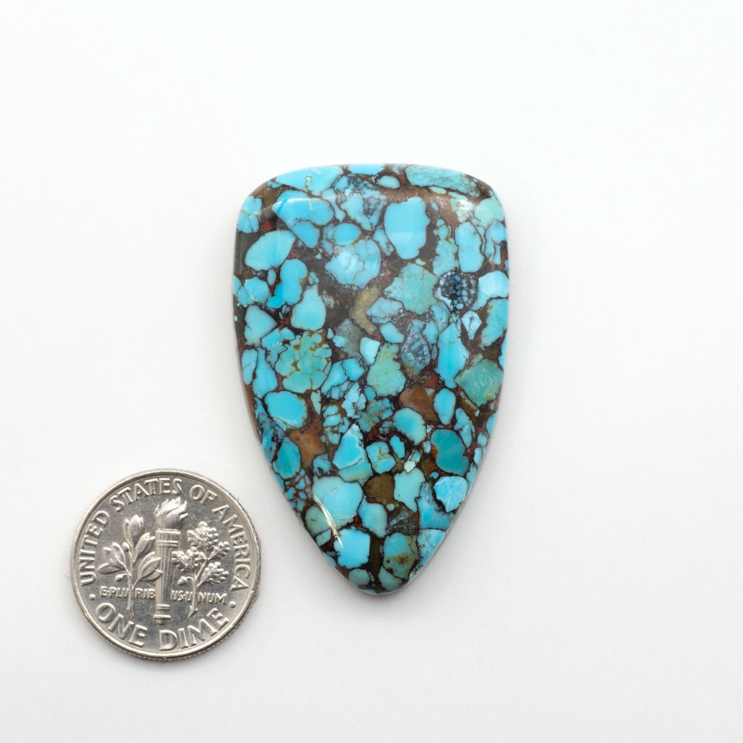 Enhance your jewelry designs with Pressed Turquoise Nugget Cabochons. Crafted from composite materials they add a captivating touch to your creations.