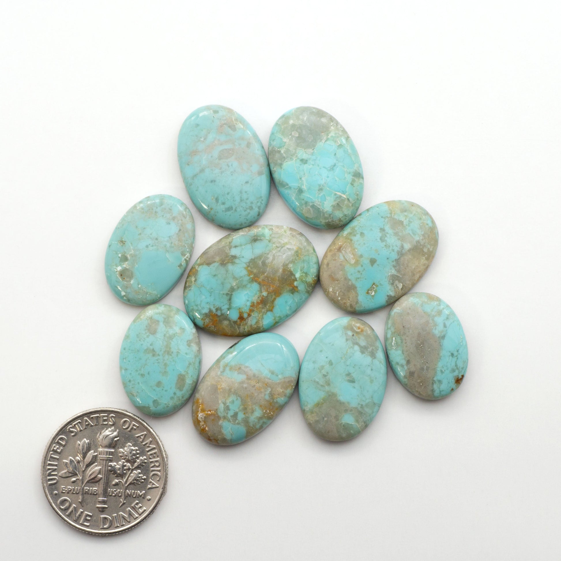 Add a touch of beauty to your collection with our stunning Pilot Mountain Turquoise Cabochons. Perfect for jewelry making each piece is truly one-of-a-kind.