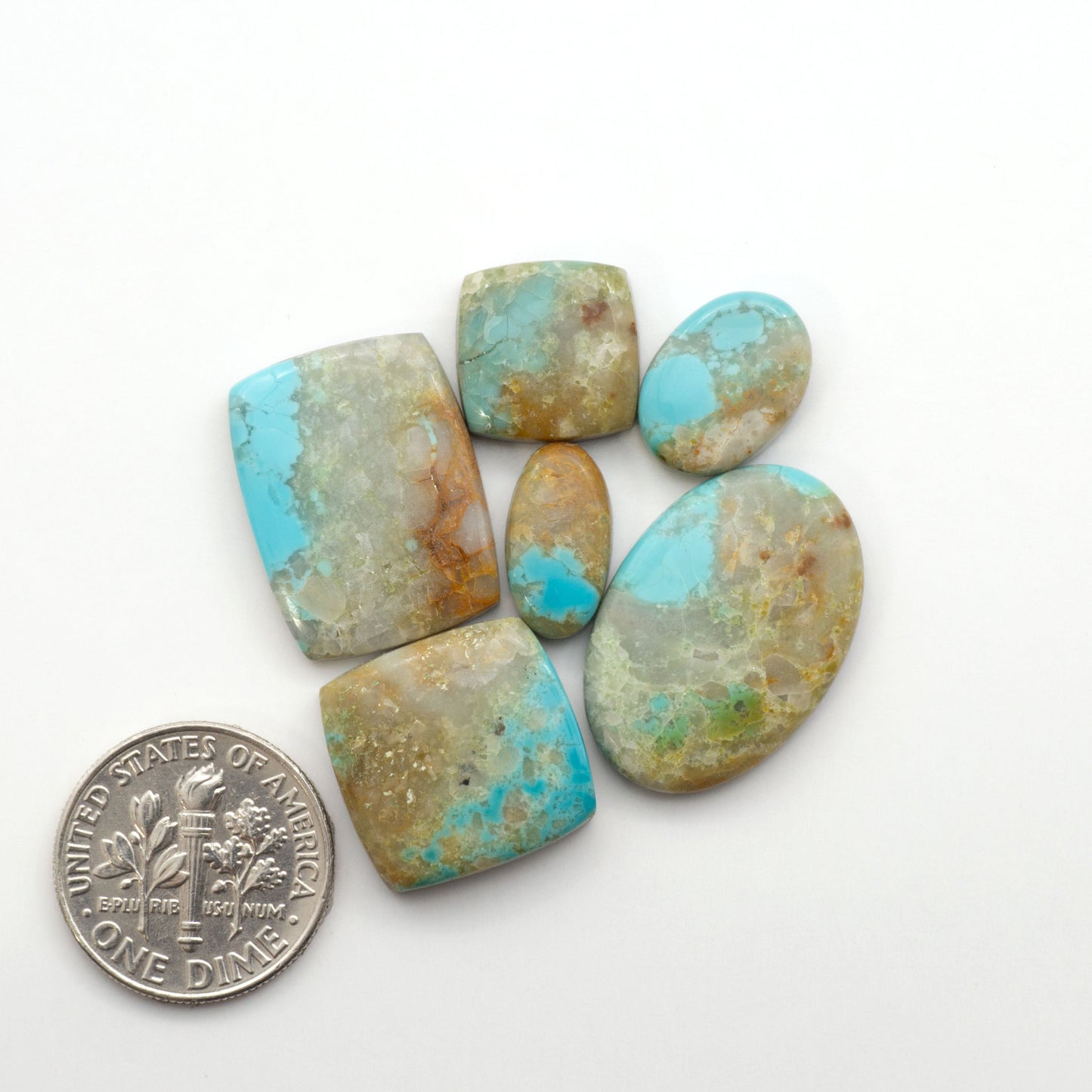 Add a touch of beauty to your collection with our stunning Pilot Mountain Turquoise Cabochons. Perfect for jewelry making each piece is truly one-of-a-kind.