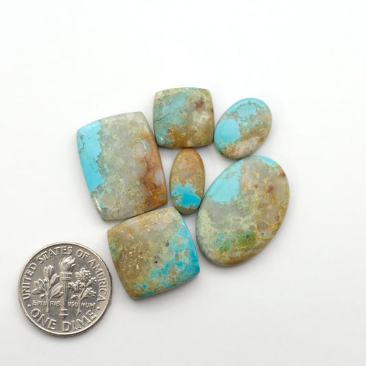 Add a touch of beauty to your collection with our stunning Pilot Mountain Turquoise Cabochons. Perfect for jewelry making each piece is truly one-of-a-kind.