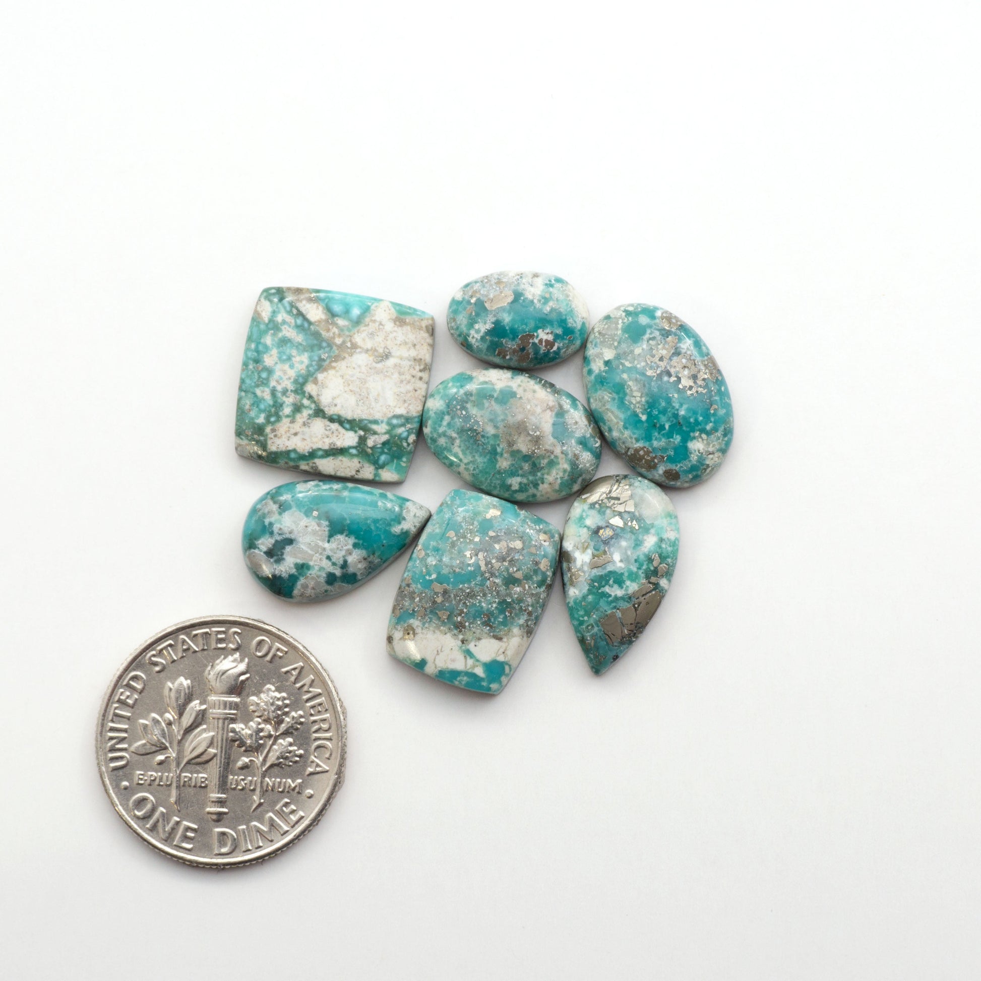 White Water Turquoise Cabochons with their mesmerizing patterns and one-of-a-kind colors, are perfect for those looking for a unique and eye-catching piece.