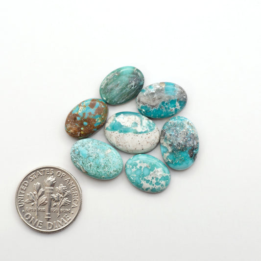 White Water Turquoise Cabochons with their mesmerizing patterns and one-of-a-kind colors, are perfect for those looking for a unique and eye-catching piece.