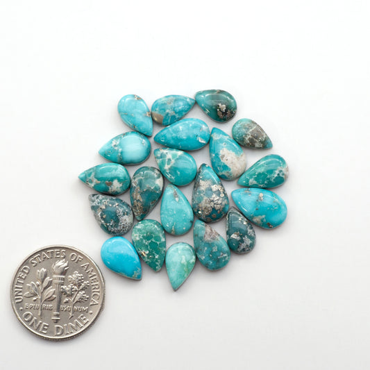 White Water Turquoise Cabochons with their mesmerizing patterns and one-of-a-kind colors, are perfect for those looking for a unique and eye-catching piece.