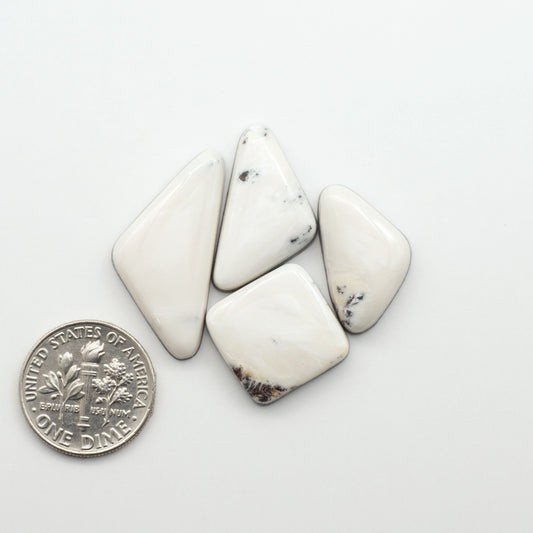 Natural White Buffalo Stone Cabochons are semi-precious gemstones cut into shapes ideal for jewelry-making, making them an excellent choice for artisans.