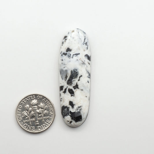 Natural White Buffalo Stone Cabochons are semi-precious gemstones cut into shapes ideal for jewelry-making, making them an excellent choice for artisans.