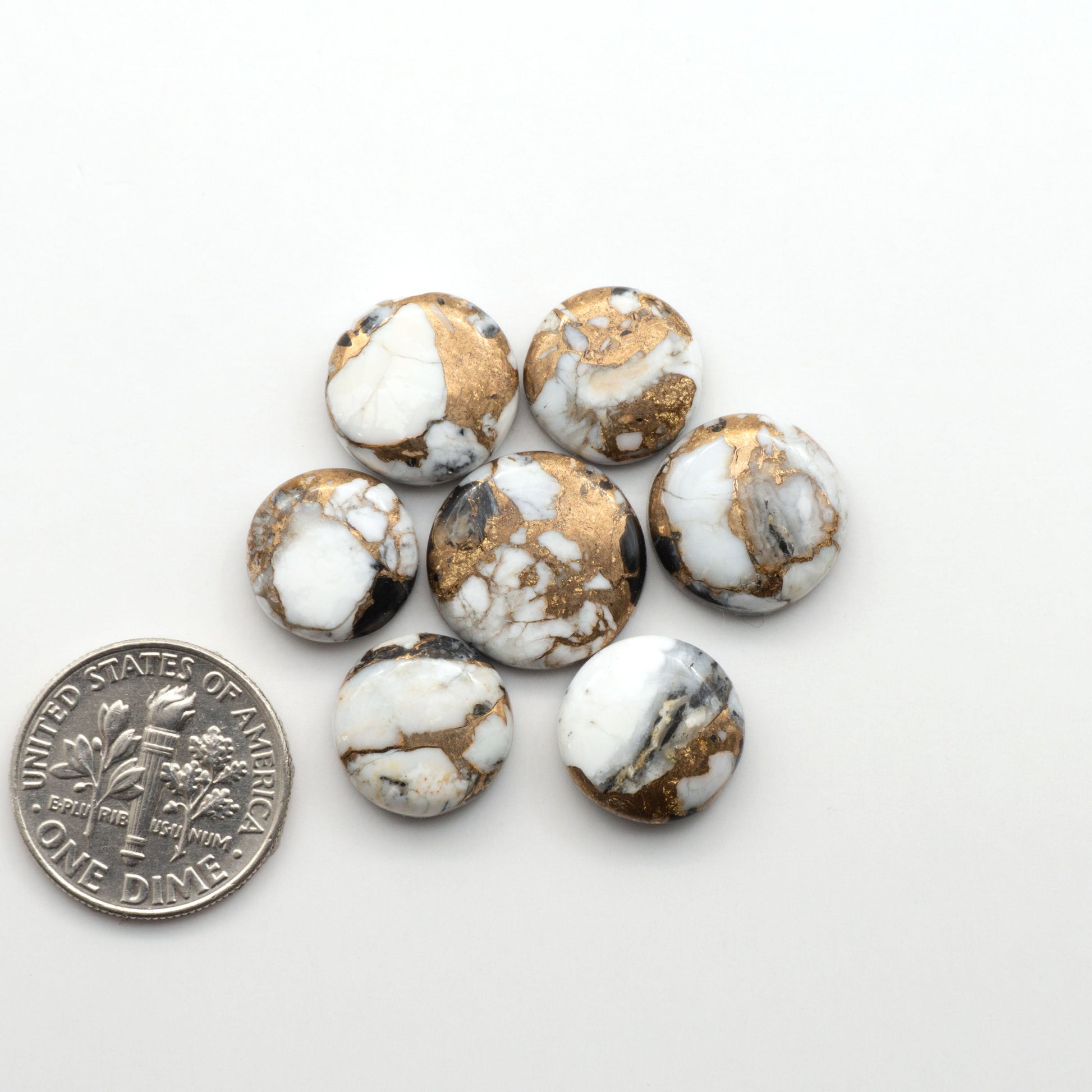 Elevate your jewelry pieces with these stunning White Buffalo Cabochons. With their unique and intricate patterns, they add a touch of elegance to any design.