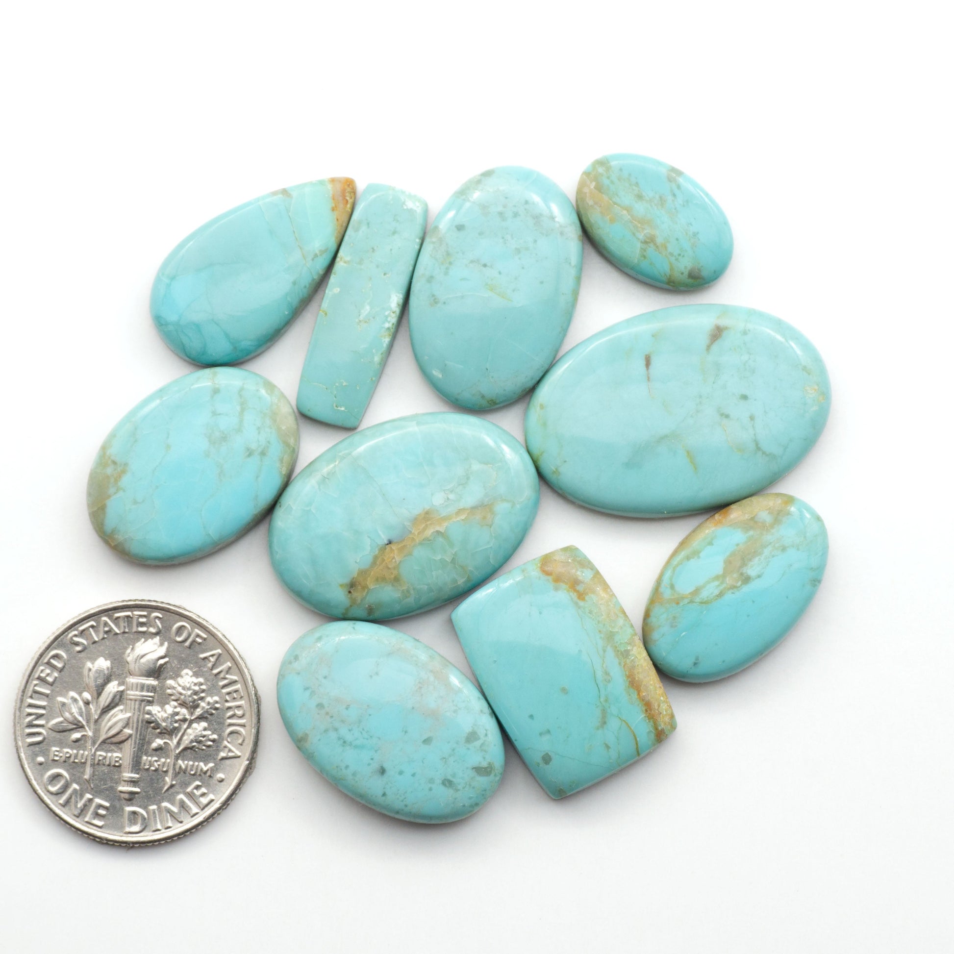 Add a touch of beauty to your collection with our stunning Pilot Mountain Turquoise Cabochons. Perfect for jewelry making each piece is truly one-of-a-kind.