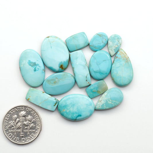Add a touch of beauty to your collection with our stunning Pilot Mountain Turquoise Cabochons. Perfect for jewelry making each piece is truly one-of-a-kind.