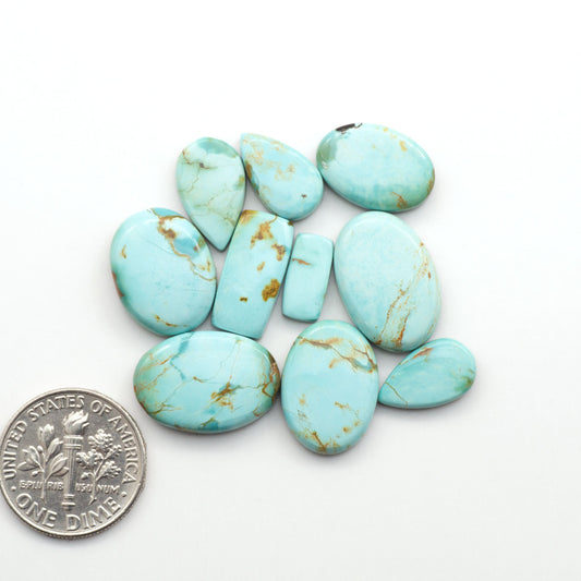 Add a touch of beauty to your collection with our stunning Pilot Mountain Turquoise Cabochons. Perfect for jewelry making each piece is truly one-of-a-kind.