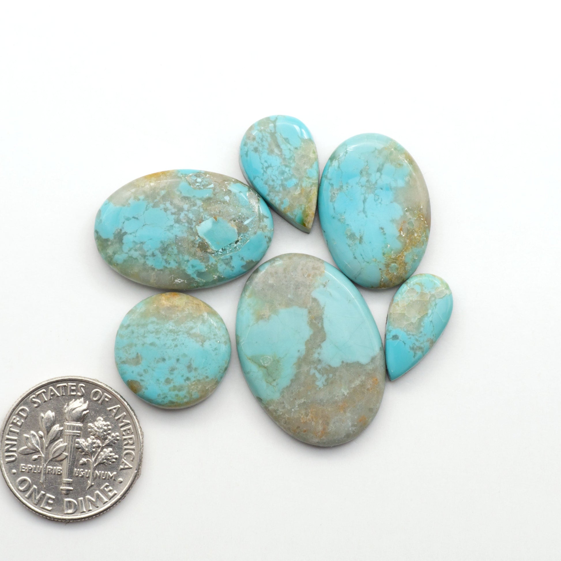 Add a touch of beauty to your collection with our stunning Pilot Mountain Turquoise Cabochons. Perfect for jewelry making each piece is truly one-of-a-kind.