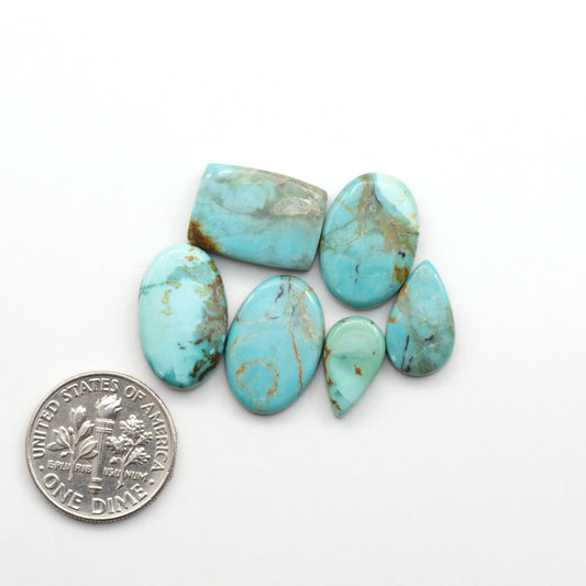 Add a touch of beauty to your collection with our stunning Pilot Mountain Turquoise Cabochons. Perfect for jewelry making each piece is truly one-of-a-kind.